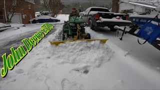 Plowing my Neighbors out in a blizzard  John Deere x570 [upl. by Ailam]