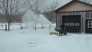 John Deere X300 with 44quot snowblower in action [upl. by Yanal]