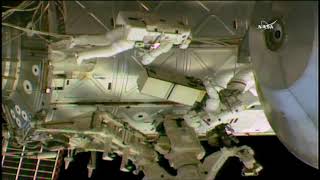 Spacewalking astronauts tackle pump work at space station [upl. by Idieh]