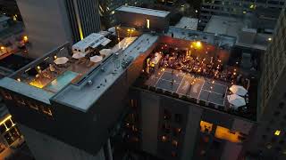 Dinkville Rooftop Pickleball Court Bobby Hotel Nashville Night Video [upl. by Ahsimet]