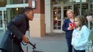 Downtown Spokane street performer Bryson Andres gives guidance to a kid [upl. by Attemaj752]