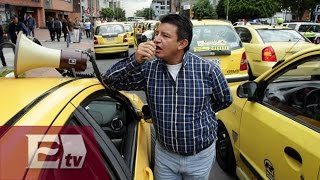 Taxistas colombianos protestan contra los servicios Uber en su país  Titulares de la tarde [upl. by Aleda]