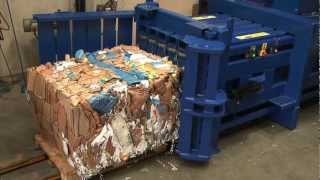 HZ 70T Horizontal baler making a bale from cardboard boxes [upl. by Adnarahs]