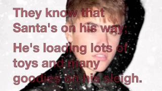 Justin Bieber  The Christmas Song LYRICS Chestnuts Roasting on an Open Fire [upl. by Pergrim]