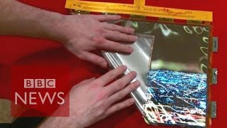 CES 2016 LGs bendy rollup OLED screen  BBC News [upl. by Wehttam21]