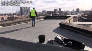 Stripping a old felt roof and overlaying with a new roofing membrane [upl. by Tedric481]