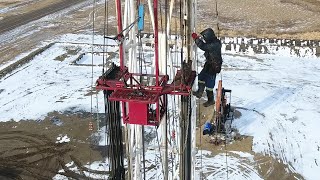 Independent Well Servicing  service rig running rods and tubing in the Bakken at Stoughton Sask [upl. by Altheta810]