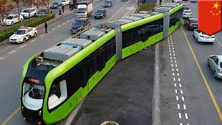 Smart train Worlds first trackless smart train begins test run in China  TomoNews [upl. by Shelley]