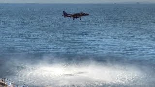 Harrier Jump Jet Performs Vertical Takeoff And Landing On Ship [upl. by Aitekram]