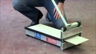 How to use the Hire Station laminate floor cutter [upl. by Notsuh]