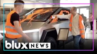 Tesla Cybertruck attacked by Climate Change activists with Paint – But Its Electric  blux [upl. by Caraviello]