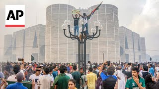 Celebrations in Bangladesh after Prime Minister Sheikh Hasina resigns and flees country [upl. by Atival]