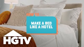 How to House How to Make a Bed Like a Hotel  HGTV [upl. by Nnyllatsyrc]