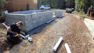 Footing Drain Rock Fabric Drainboard Scraps and Finally a Back filled Garage Foundation [upl. by Anileme]