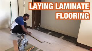 Laying laminate flooring in a bedroom [upl. by Jo-Ann]