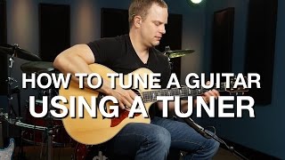 How To Tune A Guitar Using A Tuner [upl. by Atalanta]