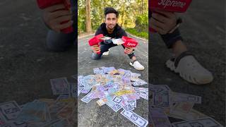 Two Supreme Money Gun Unboxing and Testing 🔥💵🔫 moneygun [upl. by Yenatirb532]