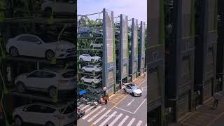 This vertical smart rotary parking system can help the owner retrieve his or her car in 60 seconds [upl. by Teirrah449]