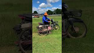 The process of cutting grass on a motorcycle [upl. by Corell106]