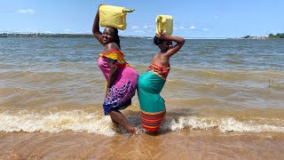 RURAL Village Girls Fetching Water From The Biggest Lake In Africa [upl. by Elmo5]