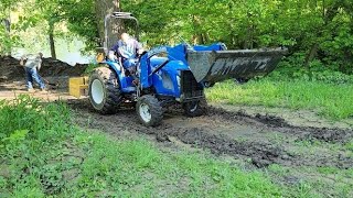 New Holland Workmaster 40 Compact Tractor Cleaning Mud Off the Boat Ramp NOT a Job for a Subcompact [upl. by Eilyah]