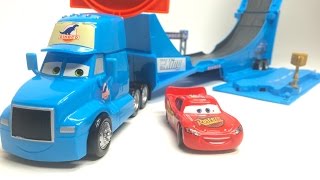 Disney Pixar Cars Dinoco Drop amp Jump Gray Truck amp Trailer and featuring Lighting McQueen [upl. by Enoob652]