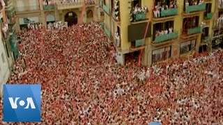 San Fermin Festival Kicks Off in Spain  VOA News [upl. by Neltiak]