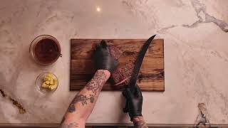 SkinnyAmerica — Brisket Burnt Ends how to cube and coat in sauce [upl. by Atilef]