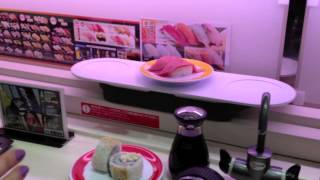 Automated sushi delivery at Genki Sushi Shibuya Tokyo [upl. by Enirual707]