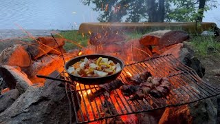 Canoe camping  Hammocks amp RAIN  Bacon wrapped steak tips  Campfire cooking [upl. by Ahsiugal]