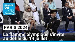 Paris 2024  la flamme olympique sinvite aux festivités du 14 juillet dans la capitale [upl. by Idyak]