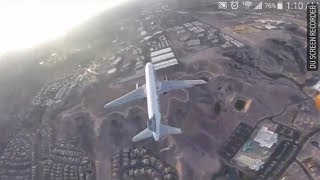 Drone has frightening apparent close call with jet [upl. by Ivah]