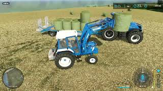 FS22  FAIRHEAD 67  STACKING BALES ON THE LOW LOADER [upl. by Olegnaleahcim]