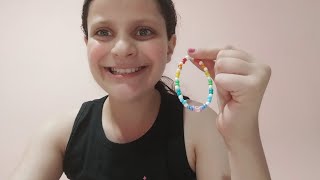 Fiz uma pulseira de miçangas coloridas [upl. by Brana959]