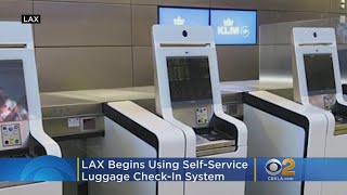 LAX Begins Using SelfService Luggage CheckIn System [upl. by Tillford45]