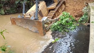 Bulldozer crossing over the river and assisted by excavator Equipment amp Operator Channel [upl. by Bissell]