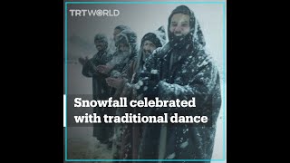 Saudi men celebrate snowfall by performing traditional dance [upl. by Trub663]