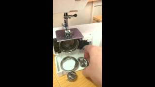 How to pull apart and reassemble the bobbin case area on a front loading sewing machine [upl. by Rush203]