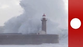 Atlantic storm Huge waves crash into lighthouse in Portugal [upl. by Hadihsar568]