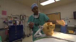 CNN Gupta Removing part of a skull [upl. by Acimaj975]