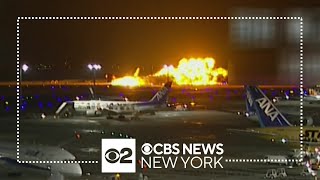 Plane engulfed in flames on runway at Tokyos Haneda Airport [upl. by Hovey632]