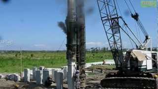 Link Belt Diesel Powered Pile Driver Hammer Working [upl. by Yelnoc]