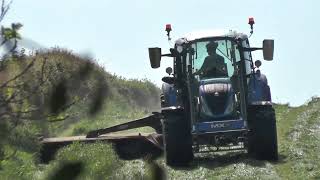 Mowing the field next to my house with new holland T5120 [upl. by Helbon46]