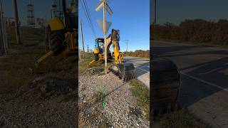 Backhoe digging by the train tracks construction shorts excavator [upl. by Annej]