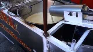 DIY churro press uses engine piston  Tijuana Mexico street vendor [upl. by Kilbride522]