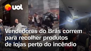 Incêndio no Brás Vídeos mostram correria de vendedores para recolher produtos de lojas [upl. by Adnahs]