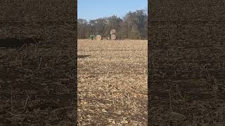 Moving Cornstalk Bales johndeere powershift farming [upl. by Emyle]