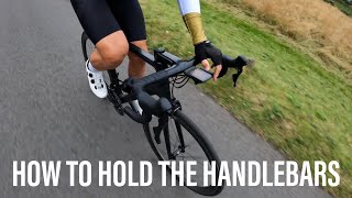 How to hold the road bike handlebars for power and stability [upl. by Lehet165]