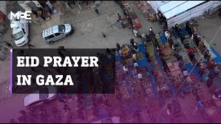 Eid prayers in Gaza amidst the ruins of a Mosque [upl. by Lesde]