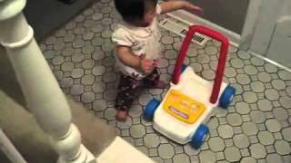 Cute 11 month baby climbing stairs and using walker [upl. by Neztnaj490]